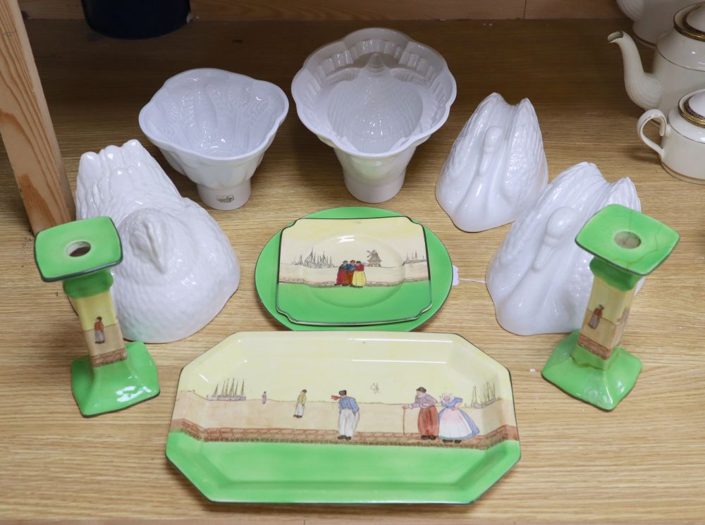 A small collection of Royal Doulton Dutch Harlem seriesware and five white-glazed jelly moulds,